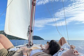 Sailing boat with aperitif at sunset in Cilento