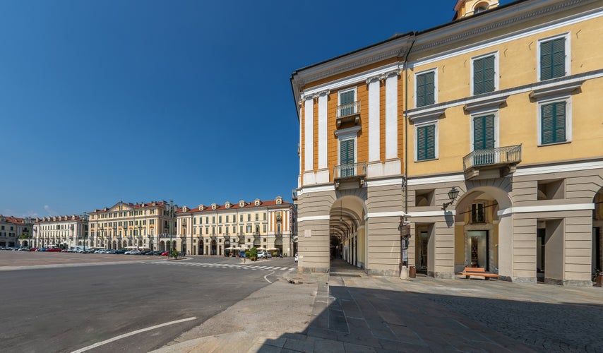 photo of Cuneo, Piedmont, Italy - Piazza Tancredi Duccio GalimbertI, main square of Cuneo with historic neoclassical buildings, as seen from Via Roma.