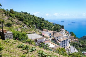 Photo of aerial morning view of Amalfi cityscape on coast line of Mediterranean sea, Italy.