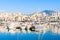 Photo of View of Puerto Banus marina with boats and white houses in Marbella town at sunrise, Andalusia, Spain.