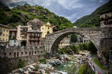 Ancient roman bridge over torrent Lys in Pont Saint Martin, Italy
