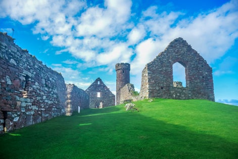Landscape view of Peel Castle constructed by vikings on top of Peel hill, Isle of Man.