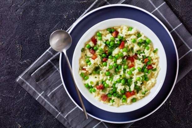 Plate of risotto alla primavera, featuring vibrant spring vegetables..jpg