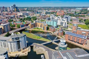 Photo of aerial view of the famous Blackpool Tower and beach on a beautiful Summer day on one of Great Britains most popular holiday destinations, England.