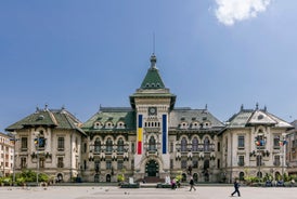 Photo of the facade of the Administrative Palace of Craiova (today Dolj Prefecture and County Council), an imposing historical monument located on the territory of Craiova, Romania.