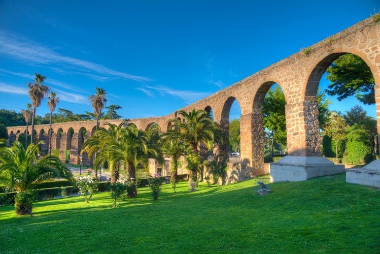 Photo of ruins of the ancient Roman aqueduct in the town of Plasencia, Spain