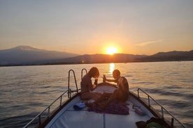 Aperitivo al tramonto a Taormina a bordo