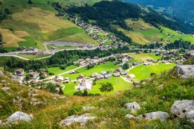 photo of Annecy city center panoramic aerial view with the old town, castle, Thiou river and mountains surrounding the lake, beautiful summer vacation tourism destination in France, Europe.