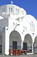 Photo of beautiful White architecture of Oia village on Santorini island, Greece.