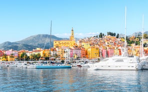 Photo of aerial cityscape view on French riviera with yachts in Cannes city, France.