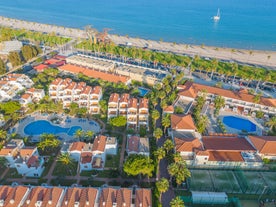 Photo of panoramic aerial view of beautiful Blanes in Costa Brava on a beautiful summer day, Spain.