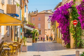 Photo of beautiful aerial view of Saint-Tropez, France with seascape and blue sky.