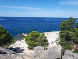 Photo of aerial view of town of Rovinj historic peninsula , famous tourist destination in Istria region of Croatia.