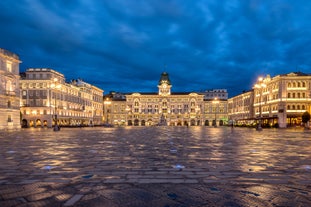 Photo of Trieste lighthouse Phare de la Victoire and cityscape panoramic aerial view, Friuli Venezia Giulia region of Italy.