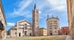 Photo of panorama of Parma cathedral with Baptistery leaning tower on the central square in Parma town in Italy.