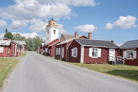 photo of sunny morning view of world Heritage Gammelstad Church Town in Luleå, Sweden.