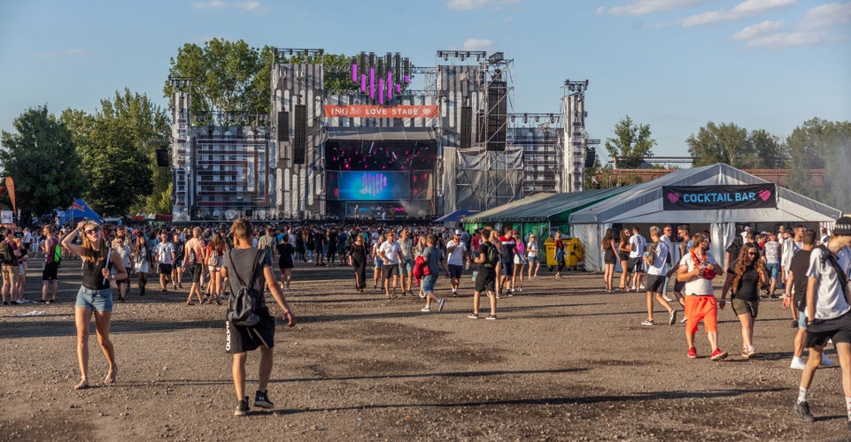 Festivalgoers gathering at ING Love Stage during daytime at Beats for Love, a top electronic music festival in Czechia in July..jpg