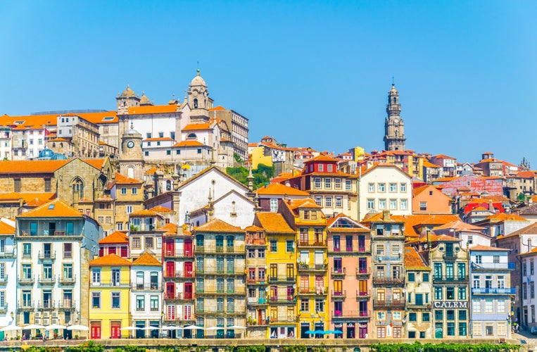 Photo of aerial view of porto dominated by torre dos clerigos tower, Portugal.