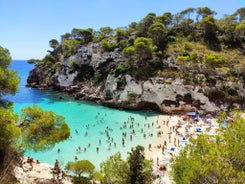 Photo of Cala Macarelleta in Ciutadella Menorca at turquoise Balearic Islands, Spain.