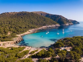 Photo of aerial view of Cala Agulla and beautiful coast at Cala Ratjada, Mallorca, Spain.