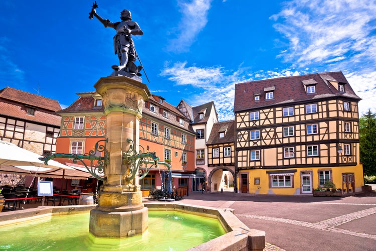 Photo of Colorful historic town of Colmar square and fountain view, Alsace region of France.