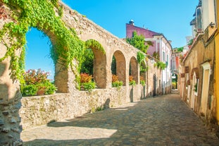 Photo of aerial morning view of Amalfi cityscape on coast line of Mediterranean sea, Italy.