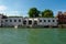 photo of the Grand Canal and the Peggy Guggenheim Collection. Clear blue skies and wonderful water in the canal. Perfect water trip for a tourist venice italy.