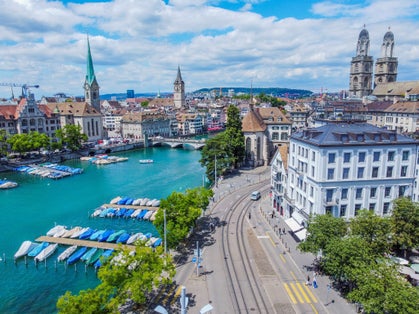 Photo of Aerophotography.View from a flying drone.Panoramic view of the historical center of Zurich with the famous Fraumunster and Grossmünster churches.