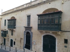 Aerial view of Lady of Mount Carmel church, St.Paul's Cathedral in Valletta embankment city center, Malta.