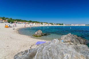 photo of aerial view of Argelès-sur-Mer with sandy beach in the Pyrénées, France.