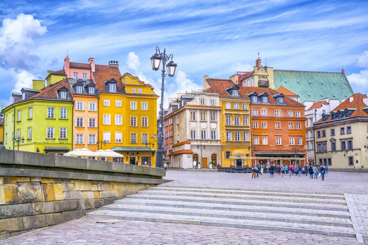 Photo of colorful houses in Castle Square in the old town of Warsaw, Poland.