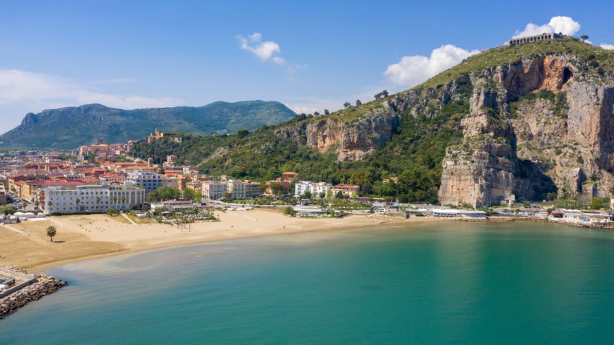 A view from the Terracina pier to the mountain Pisco Montano with the famous ancient ruins of Jupiter Anxur temple or Tempio di Giove Anxur at the top. Province of Latina, Lazio region, Italy.