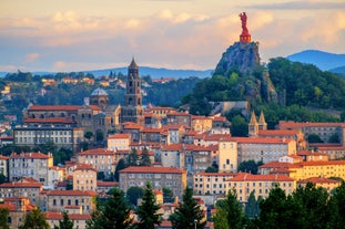 Photo of panoramic view of the city of Clermont-Ferrand with its cathedral, France.