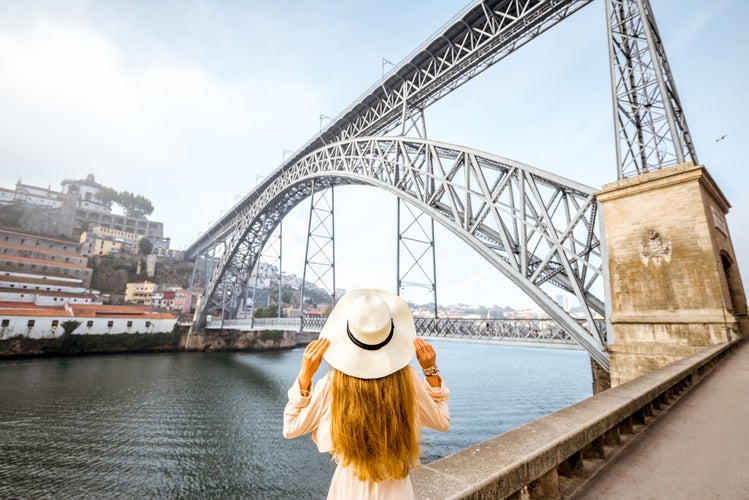 woman looking at the the Magnificent Dom Luis I Bridge.jpg