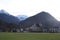 photo of adventurers Paragliding at Interlaken Hohematte Park in winter in Switzerland.