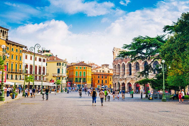 Photo of Cityscape of Verona with Piazza Bra and Verona Arena on a sunny day in Verona, Italy.