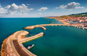 photo of aerial landscape photography of splendid summer view from flying drone of Montesilvano public beach. Wonderful morning seascape of Adriatic Sea in Italy, Europe.