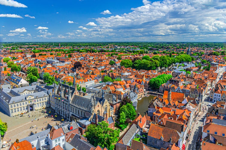 Aerial view of Bruges city centre, old buildings tiled roofs, Bruges City Hall Stadhuis, Basilica of Holy Blood, Brugse Vrije palace, Rosary Quay Rozenhoedkaai, skyline of Brugge old town, Belgium