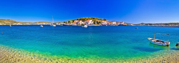 Photo of Rogoznica turquoise bay and Dragon Eye lake aerial view, Dalmatia region of Croatia.