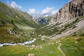 Photo of  beautiful Scuol town in Swiss Alps and Inn river, Switzerland.