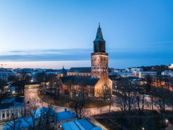 Early autumn morning panorama of the Port of Turku, Finland, with Turku Castle at background.