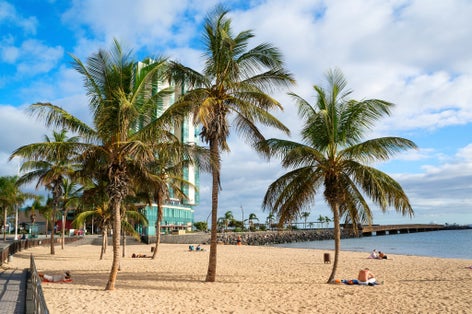 Photo of beautiful beach in the capital of the island city of Arrecife, Canary Islands, Spain.