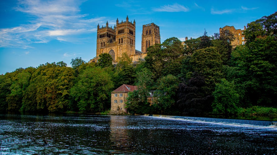 photo of view of Durham Cathedral Towers Over The River Wear.