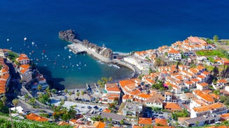 Aerial drone view of Camara de Lobos village, Madeira.