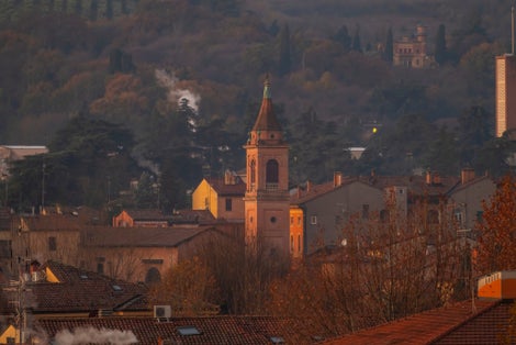 photo of Bologna capital of the Emilia Romagna region urban architecture images historical buildings two towers Maggiore square San Petriono basilica .