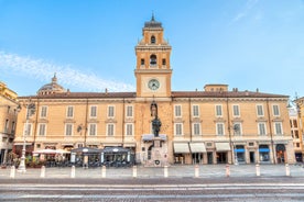 Photo of panorama of Parma cathedral with Baptistery leaning tower on the central square in Parma town in Italy.