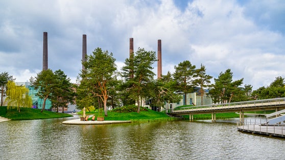 photo of view of A beautiful view of a green Autostadt park in Wolfsburg, Germany on a sunny day