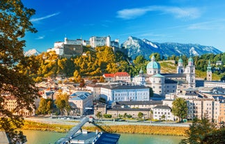 Panoramic view of historic Zurich city center with famous Fraumunster, Grossmunster and St. Peter and river Limmat at Lake Zurich on a sunny day with clouds in summer, Canton of Zurich, Switzerland