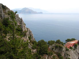 Photo of aerial view of Capri island in a beautiful summer day in Italy.