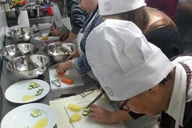 Aula de culinária em Taormina com almoço incluído